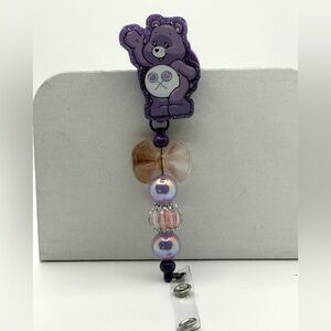 Purple Care Bear Badge Reel